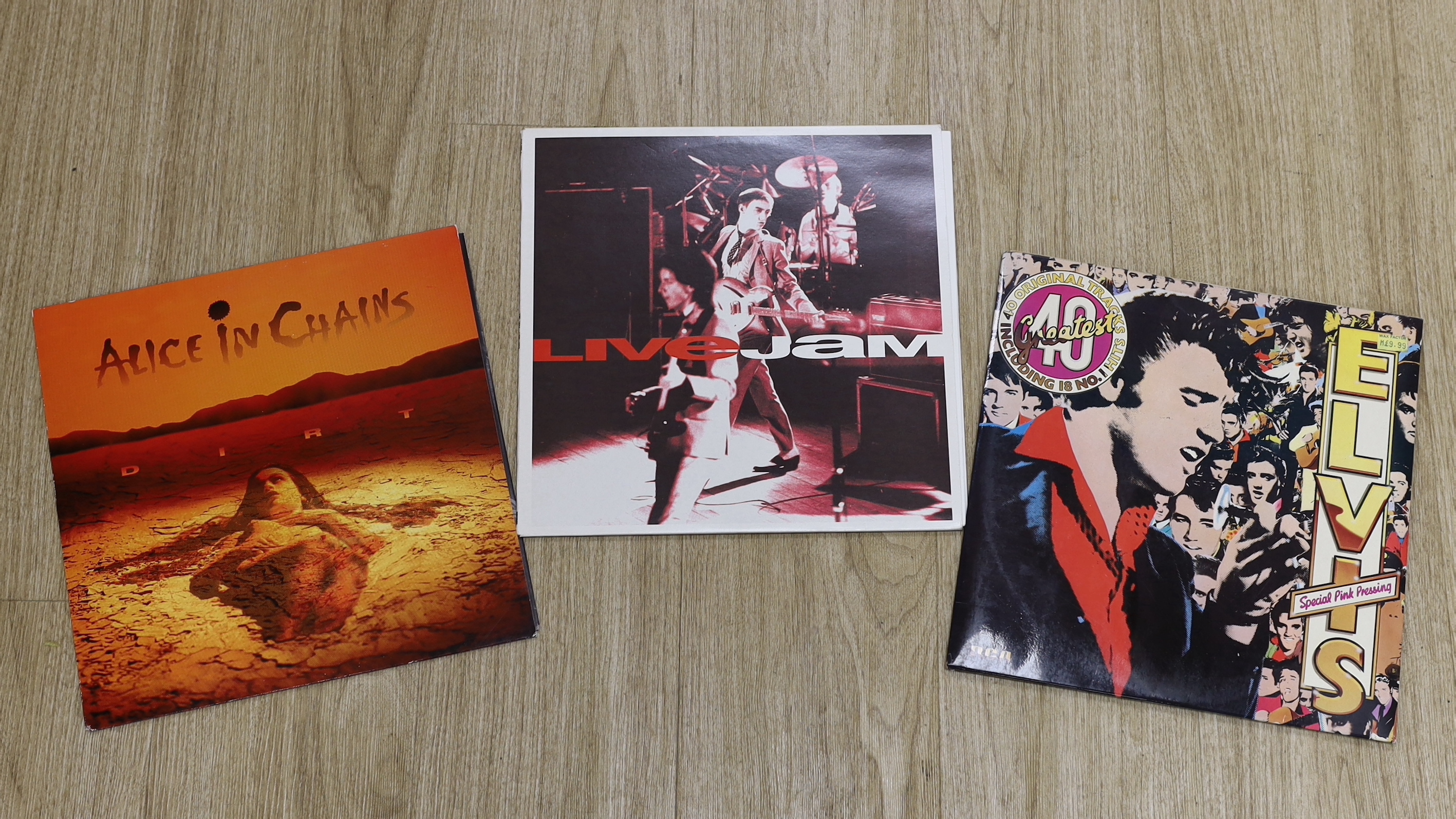 Fifty-five mainly 80's and 90's LPs, including, The Jam, Joan Armatrading, Neil Young, Mercury Rev, Thin Lizzy, Joni Mitchell, AC/DC, David Bowie, The Carpenters, Alice In Chains, etc